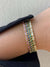 bezel bracelets layered on wrist