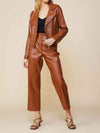 camel vegan leather biker jacket on model