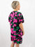 hot pink floral dress on model from back
