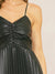 closeup of faux leather black dress