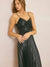 black faux leather midi dress on model showing movement