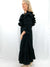 black dramatic ruffle sleeve maxi on model from side