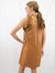 camel faux leather dress on model from back