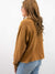 camel mineral wash cropped sweatshirt from side on model