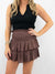 black cropped collared crop top on model with skirt
