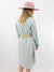 oversized denim dress on model from back