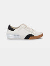 Dolce Vita Zina White and Black Leather Sneaker shown from side