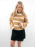 striped neutral turtleneck cropped sweater on model