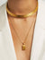24 karat gold collar necklace on model