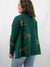 cheetah print sweater in green from back on model