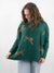 cheetah print sweater in green on model