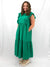 kelly green maxi dress on model showing pockets from front
