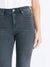black frayed hem jeans on model close up of front