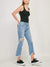 distressed mid rise jeans on model from side