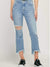 distressed mid rise jeans on model
