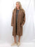 brown duster cardigan on model over dress