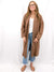 brown duster cardigan on model from front with jeans