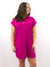 collared magenta button style shirt dress on model from front side