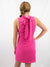 mock neck hot pink dress with tie back on model from back