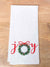 flour sack towel with joy and Christmas wreath on it