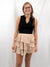 nude ruffle layered skirt on model from front