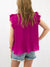 magenta ruffle top from back on model