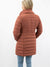 copper puffer jacket from back
