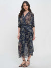 Winter Odyssey Maxi Dress by Meet Me in Santorini in navy floral pattern on model from front side