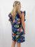 navy floral button up dress on model from back