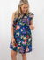 navy floral button up dress with kite sleeves on model