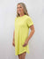 neon yellow t-shirt dress from side on model