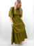 olive tiered maxi dress on model showing flowy tiered skirt