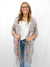 colorful knit cardigan on model from front