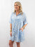 light blue and white shirt dress on model from front