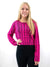 fuchsia and black cropped sweater on model from front