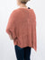 ginger color knit top from back