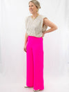 high rise hot pink dress pants on model