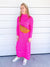 hot pink maxi sweater dress on model with belt bag