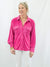 magenta pleated button down on model from front
