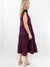 plum tiered midi dress from back on model