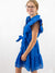 blue block print dress on model from side