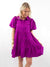 purple mini shirt dress on model showing skirt