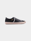 ShuShop Rebel Sneaker in black with gold Shu Shop logo shown from side