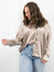 taupe silk like button up top half tucked on model from front