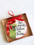round ornament that says have yourself a southern little Christmas with presents