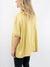 yellow oversized top from back