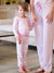 kid's pajama set on model with tiny heart details