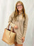 half zip dress pullover dress on model from front in tan