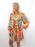 colorful babydoll shirt dress on model from front