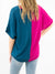 magenta and teal two tone top from back on model
